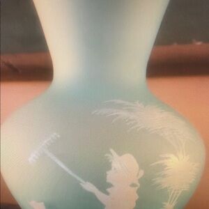 Elegant Blue Vase with White Silhouette Design
